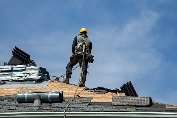 Professional Storm Damage Roof Repair technician working in Spencer, TN